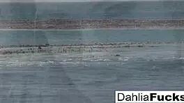Hot Dahlia squirts naughtily on the beach