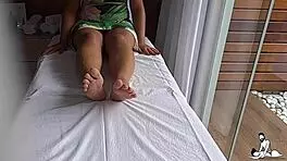 Young latina girl gets a tantric massage on the therapist's table