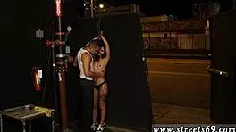 petite tattooed girl ties herself on bed