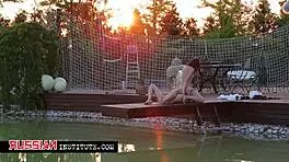 Two lesbians fingering on the pier