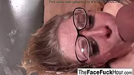 Teen in glasses eagerly slobbers on his throbbing cock