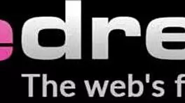 Cute 18-year-old girl masturbates with glass dildo, getting her pussy wet on camera