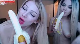 Two Brunette Babes Suck Bananas On Webcam