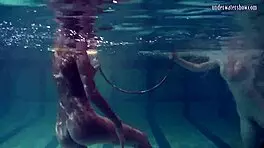 underwater lesbian bathing turns steamy on beach