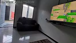 Teen brunette plays videogame on guy's lap, discovers huge interracial cock leading to amateur orgasm