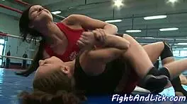 In the ring, two lezzie wrestlers passionately rub and lick each other's pussies during a glamour match