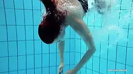redheaded katrin teasingly stripping underwater 😏