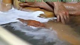 student passionately kissing boyfriend in apartment, night full of intensity and connection