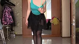 Girl in short skirt twists juicy ass with anal cork during solo masturbation homemade