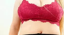 Crimson top shows off my big breasts, so wild.