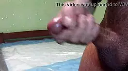 Wet cock handjob and big cumshot close-up