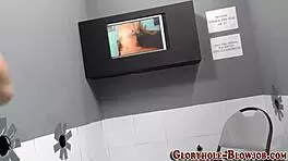 teen sucking cock for cum at gloryhole!