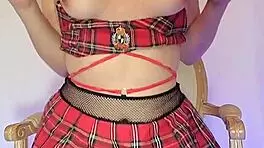 This kinky schoolgirl is playing with knives