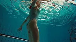 Dasha Explores Underwater Depths At The Beach