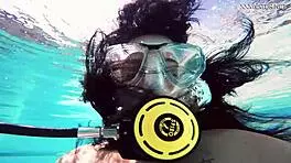 Brita piskova pleasures herself underwater in the pool, showing tits and ass