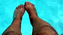 Feet in Pool with Lots of Water