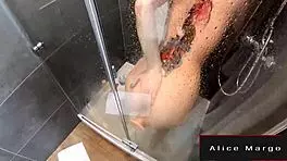 Blonde teen masturbates in shower with dildo