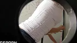 jasmina jolie sucks through the texas glory hole in the bathroom, deepthroating and footjobbing