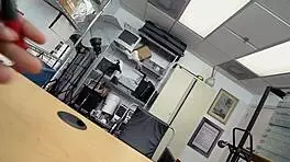 in the office, this petite teen gets hardcore interracial sex with a horny guy.