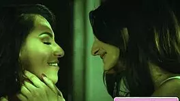 Kylie Rocket seduces Maya Woulfe, licking her big tits.