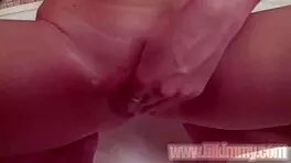 Lil Kimmy strips and masturbates in bath scene.