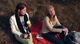 Skinny petite lesbians fuck outdoors.