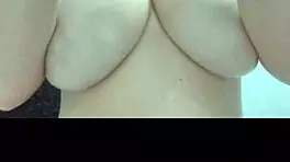 Teen 18+ girl displays her big natural tits in close-up view