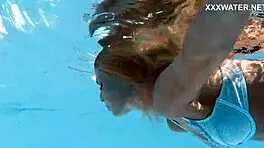 Hungarian blonde skinny pornstar enjoys swimming in the pool
