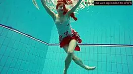 Hairy ginger Polish teen 18+ swims naked in pool underwater, showing tits in bikini