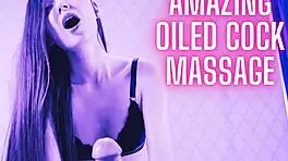 Oiled brunette gives perfect handjob leading to massive cumshot