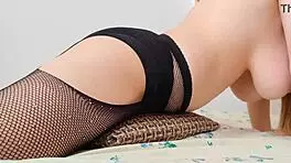 Busty cutie in sexy stockings fucks pillow luxuryorgasm