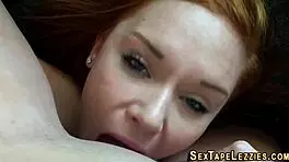 Real redhead teen engages in oral and fingering activities