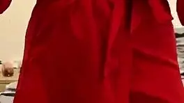 brunette in red lingerie plays with herself