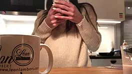 Young amateur wife does dishes while voyeur cam captures her in tight leggings and thong