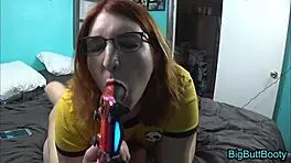 Big ass redheaded gamer girl gets groped and takes a creampie in doggystyle position