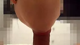 cream in mouth as she licks cock and notices