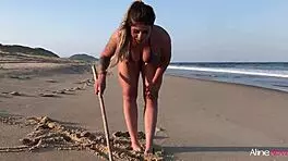 Blonde Girl On The Beach Interacts With Her Fan In An Unexpected Way