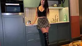 Stepmom in miniskirt and boots helps stepson forget ex with cum in mouth