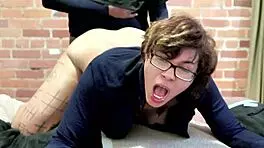 She struggles to talk while getting pounded doggystyle. Backstage, her pierced nipples shine as she screams.