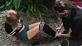 Beauty from the park gets tangled up in wild outdoor bondage. Can't believe how she moans with every tickle!