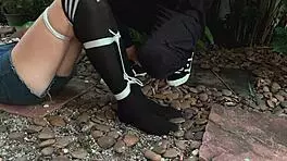 Beauty from the park gets tangled up in wild outdoor bondage. Can't believe how she moans with every tickle!