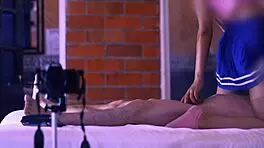 Teen student and stepmother exchange soft caresses on the sofa