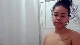Enjoying a hot shower while fingering my tight pussy