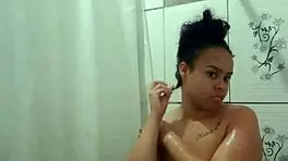 Enjoying a hot shower while fingering my tight pussy