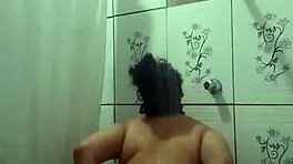 Enjoying a hot shower while fingering my tight pussy