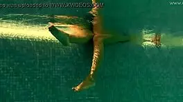 Irina's tight pussy gets wet in pool