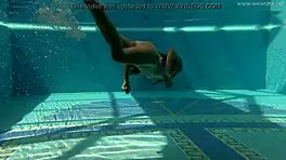 Irina's tight pussy gets wet in pool