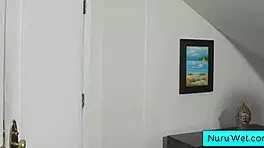 curly brunette teen rubs wet pussy on client during nuru massage