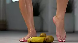 Petite Brunette Smashes Fruit with Sexy High Heels