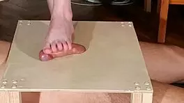 Watch domina stomp cock with bare feet! Footjob madness!